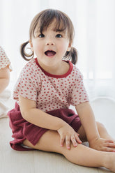 Cute Toddler Girl Wearing Avauma Mellow Pop Setup Deep Berry, Comfortable and Stylish Kids Outfit